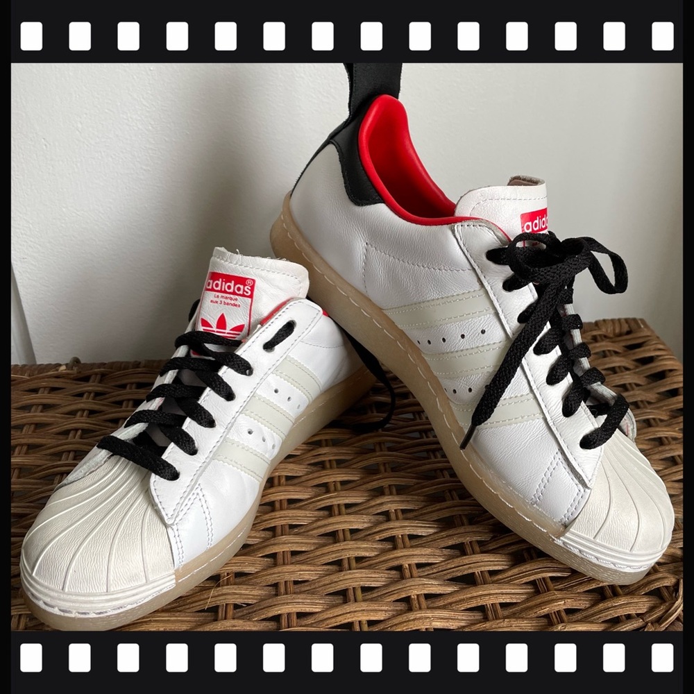 Rare Find Adidas Leather white with cream accent stripes and bank “time” ribbon